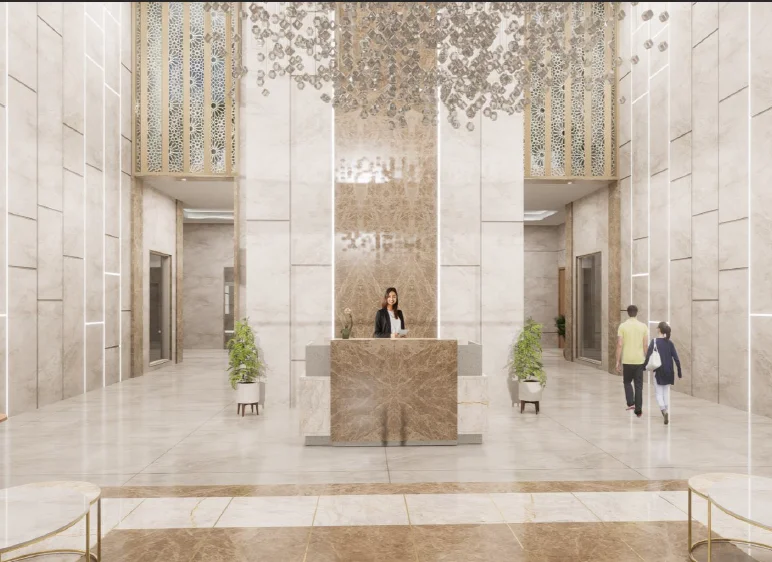 Grand double-height lobby with marble walls and crystal chandelier at Forbes Fab Luxe